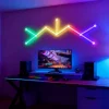 RGBIC wall-mounted LED light bars with app control and music sync for immersive ambient lighting in gaming rooms, bedrooms, streaming setups, and modern home décor by Gaming Hexagon Lights.