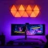 Modular RGBIC triangle LED light panels with app control and color-changing effects for gaming rooms, creative studios, and aesthetic wall décor by Gaming Hexagon Lights.