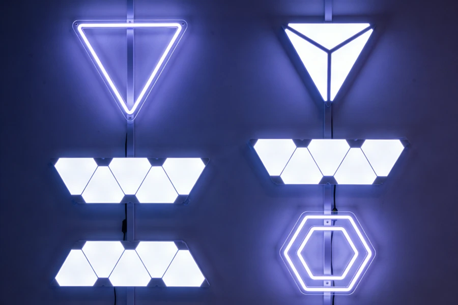 Small gaming room setup ideas with LED lighting, designed to make the room look bigger and brighter, featuring ambient and accent lighting by Gaming Hexagon Lights.